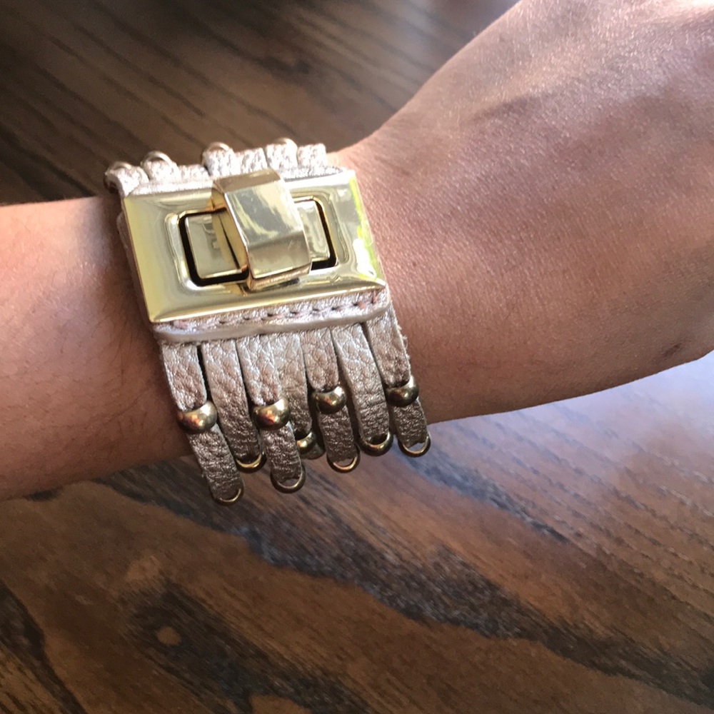 Leather bracelet with gold clasp
